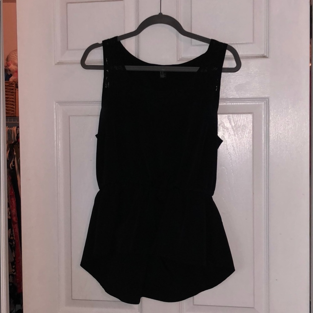 Black peplum top with lace detail on top